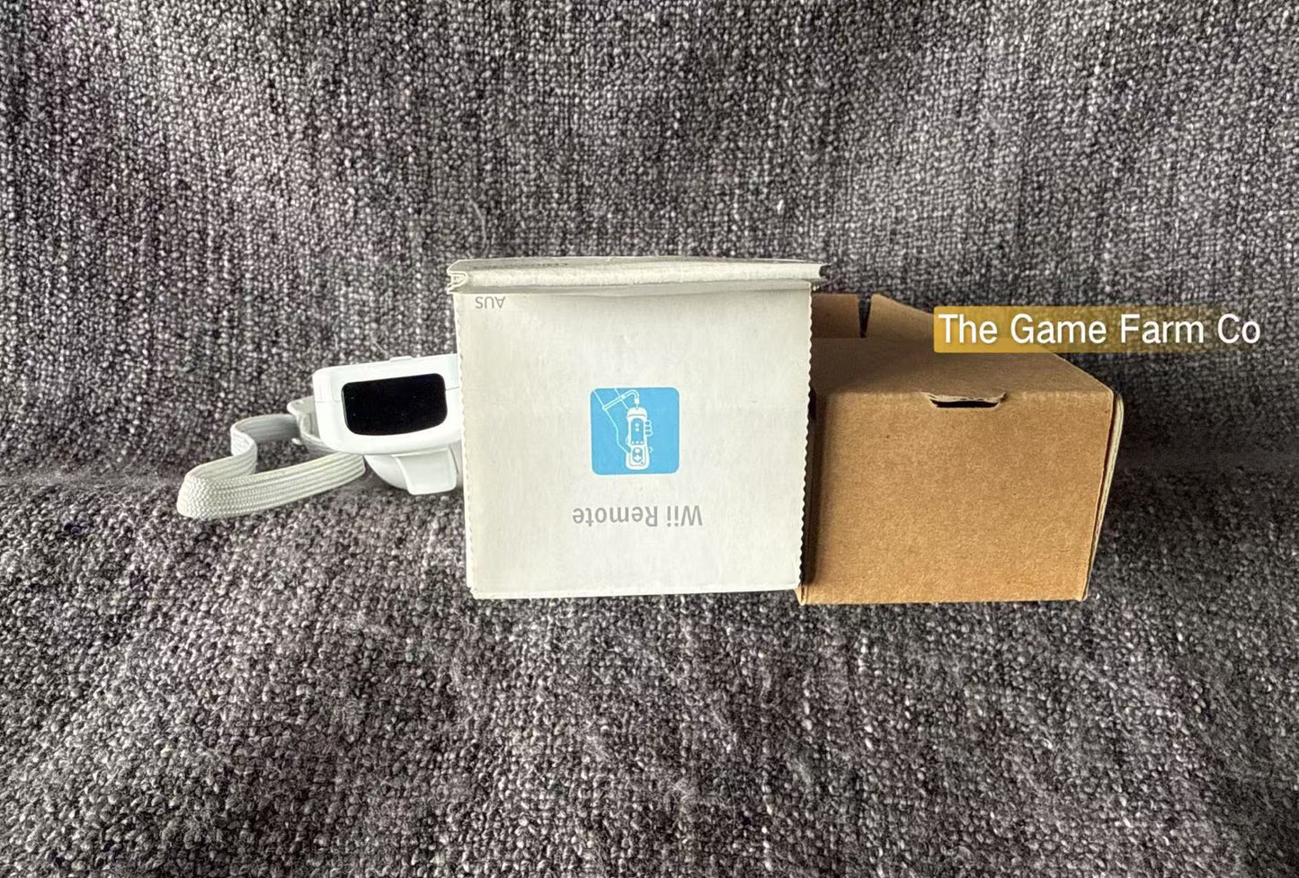 Genuine Nintendo Wii remote + Sleeve boxed in excellent condition