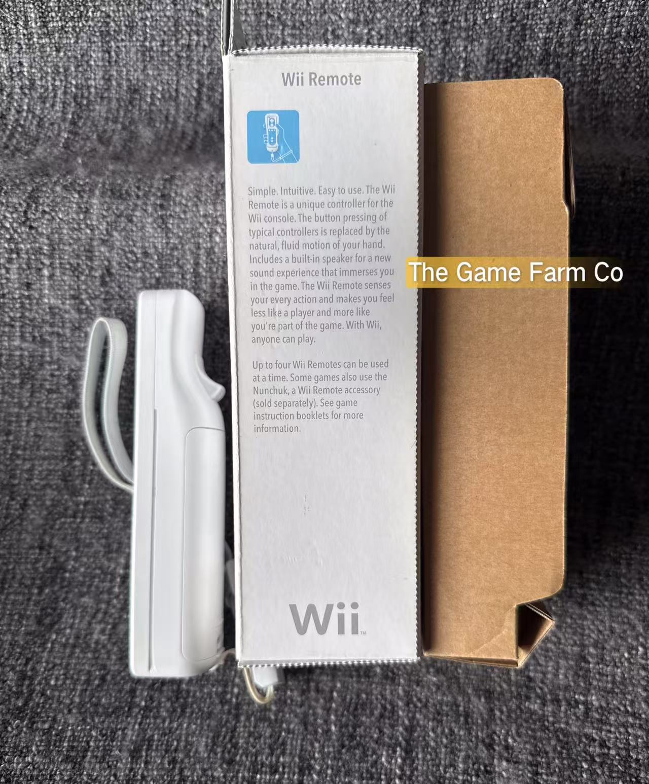 Genuine Nintendo Wii remote + Sleeve boxed in excellent condition
