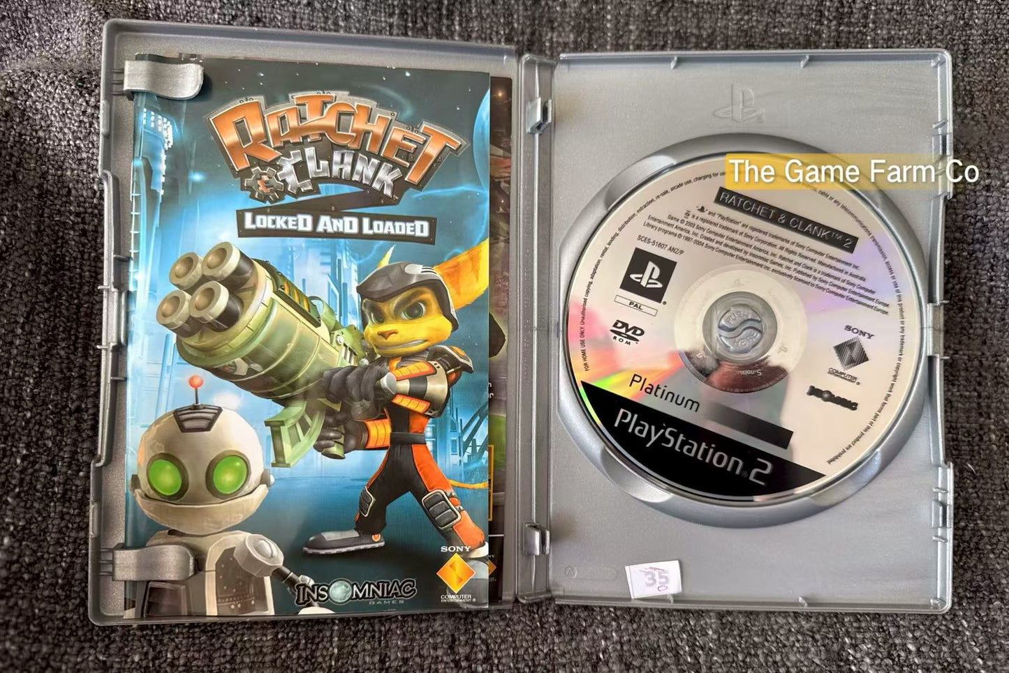 Ratchet & Clank Locked and Loaded In overall Mint Condition Game- Sony PlayStation 2 (PS2)