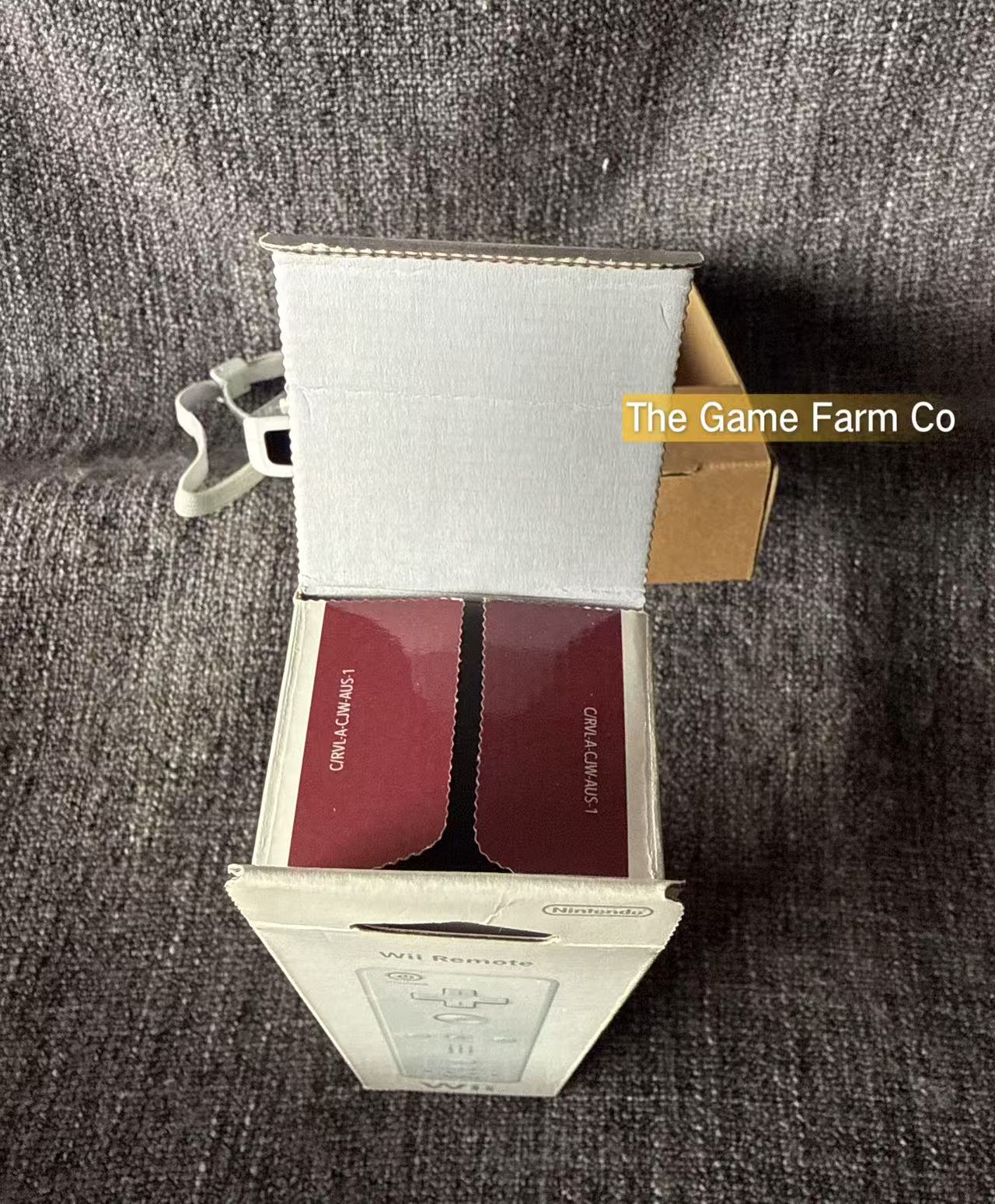 Genuine Nintendo Wii remote + Sleeve boxed in excellent condition